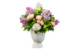 Композиция из холодного фарфора в белой керамической вазе из сирени и чайных роз
